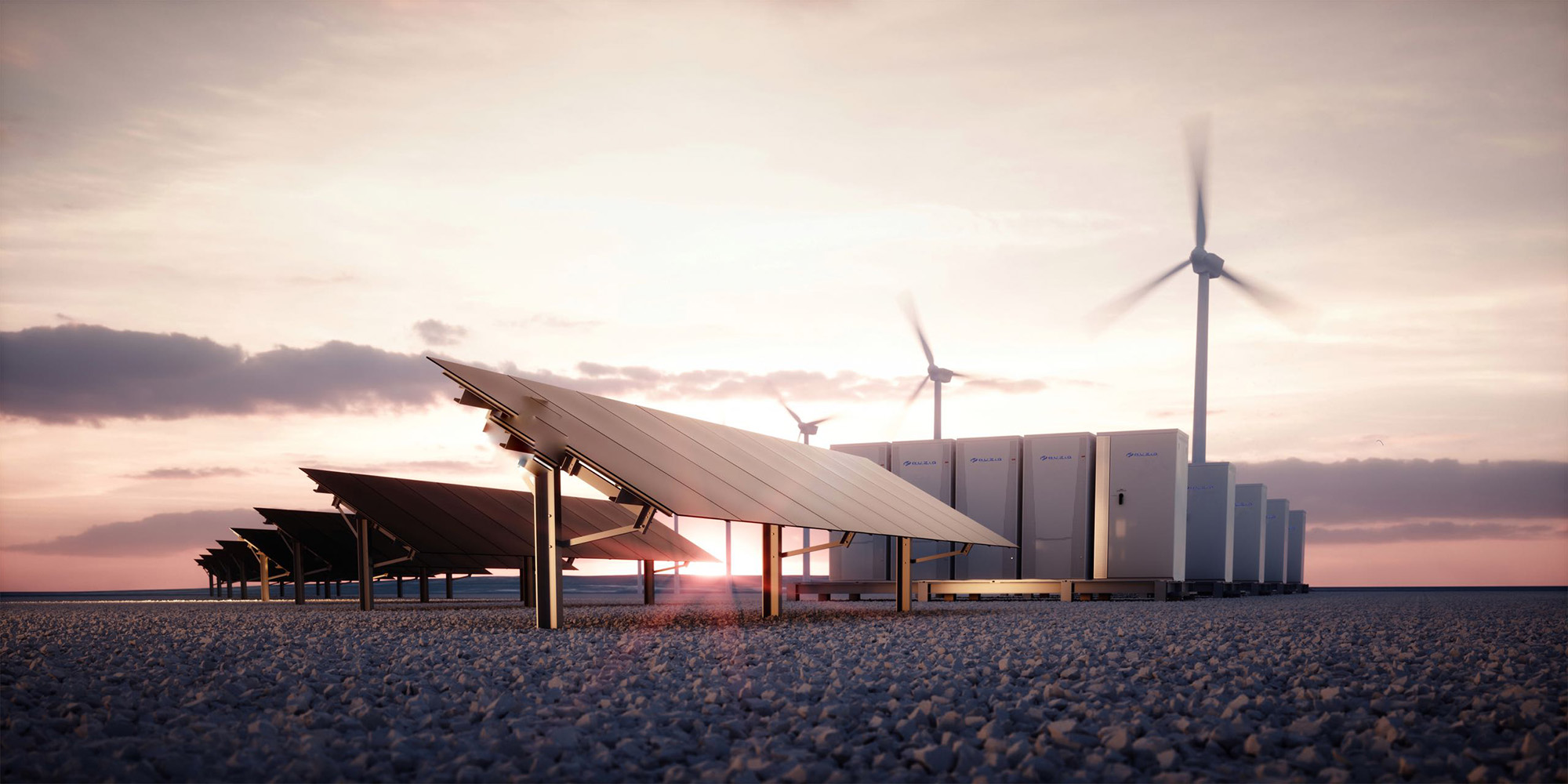 Solar panels, batteries, and wind turbines at sunset.